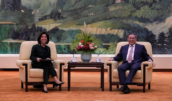 Chinese Premier Li Qiang meets US Secretary of Commerce Raimondo and says sanctions on China disastrous to global economy.