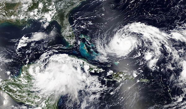 In a #NOAA20 image from Aug. 27, 2023, Tropical Storm #Idalia is seen between Cuba and Mexico's Yucatán Peninsula, while Hurricane #Franklin is near the southeastern coast of the Bahamas.