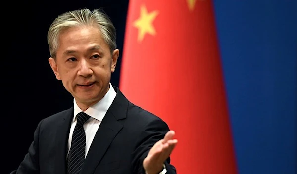 Chinese Foreign Ministry spokesperson Wang Wenbin gestures during a press conference at the Ministry of Foreign Affairs in Beijing on August 8, 2022. (AFP)