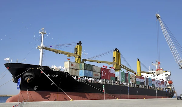 A cargo ship is docked during the inauguration ceremony of the newly built extension in the port of Chabahar on the Gulf of Oman, southeastern Iran, near the Pakistani border, December 3, 2017. (AP)