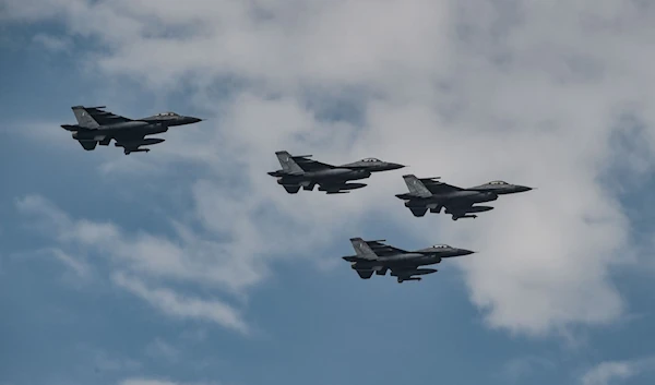 This undated photo shows four F-16 planes flying. (AFP)