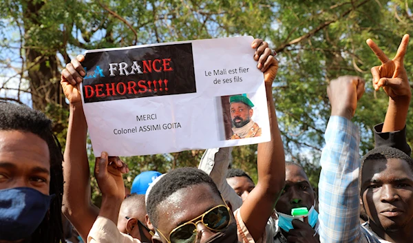 Thousands of Malians rally in Mali's capital Bamako on Jan. 14, 2021, to protest new regional economic sanctions and growing pressure from former colonizer France (AP)