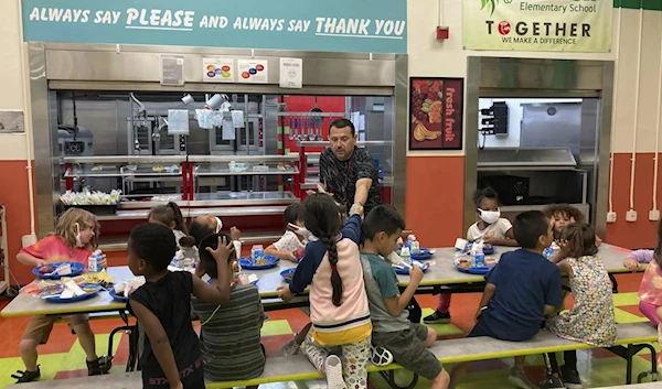 Students wrapping up their lunch break at Lowell Elementary School in Albuquerque, New Mexico, Aug. 22, 2023. (AP)