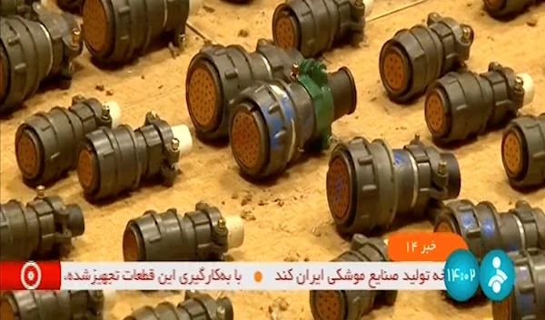 This frame grab from video footage released Thursday, Aug. 31, 2023, by Iranian state television's IRINN network shows what officials described as faulty foreign parts that could be used in a missile or a drone. (IRINN via AP)