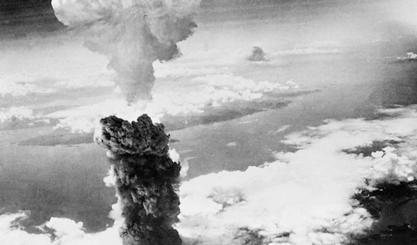 Mushroom cloud over Nagasaki, Japan, after second bomb to hit was dropped, Aug. 9, 1945. (AP)