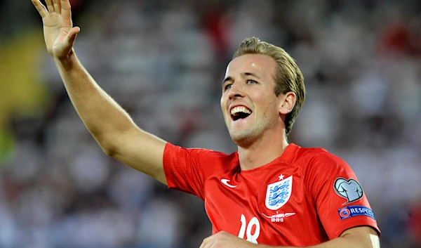 England's Harry Kane celebrates after scoring during the Euro 2016, Group E qualifying soccer match between San Marino and England, at the Serravalle stadium in San Marino, Saturday, Sept. 5, 2015. (AP)