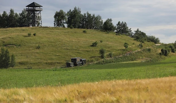 A military truck drives up the hill in Baranowo, Poland, Thursday, July 7, 2022 (AP Photo/Michal Dyjuk, File)