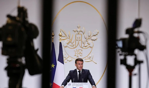 French President Emmanuel Macron gestures as he holds his annual foreign policy speech in front of French ambassadors at the Elysee Palace, in Paris, Monday Aug. 28, 2023 (Teresa Suarez, Pool via AP)