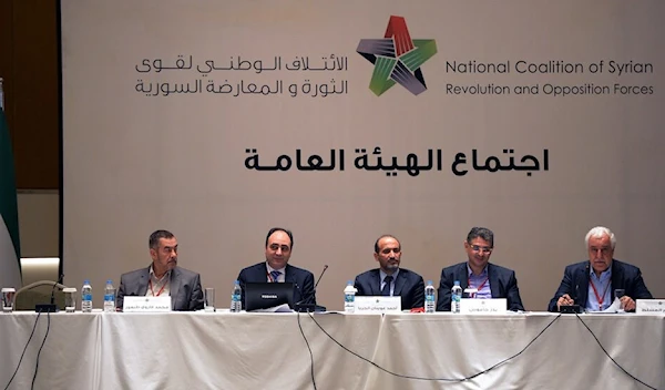 Members of the General Assembly of the Syrian Coalition seen during their meeting in Istanbul, Turkey, Friday, Sept. 13, 2013 (AP Photo)