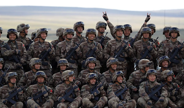 President Xi emphasizes need to develop military capacity, training