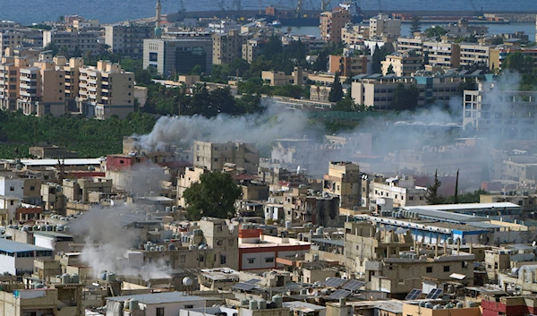 Smoke rises during clashes in the Palestinian refugee camp of Ein el-Hilweh, Saida, Lebanon, Sept. 10, 2023 (AP)