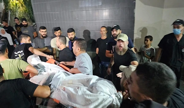 Palestinian martyr taken to the hospital in Gaza, occupied Palestine