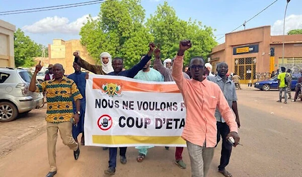 Supporters of Niger’s President Mohamed Bazoum demonstrate in his support after a military coup in Niamey, Niger, July 26, 2023. (AP)