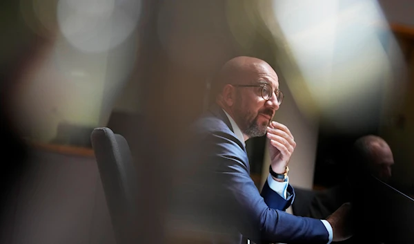 European Council President Charles Michel speaks as he participates in a videoconference with Iraq's Prime Minister Mustafa al-Kadhimi at the European Council building in Brussels, Tuesday, July 20, 2021. (AP)