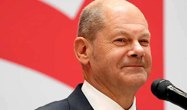 Olaf Scholz, top candidate for chancellor of the Social Democratic Party (SPD), smiles during a press conference at the party's headquarters in Berlin, Germany, Monday, Sept. 27, 2021. (AP)