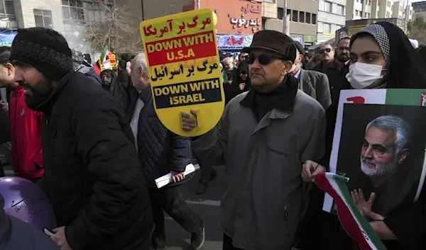 Iranians celebrate the 44th anniversary of the Islamic Revolution despite ongoing riots Feb 11, 2023 (AP)