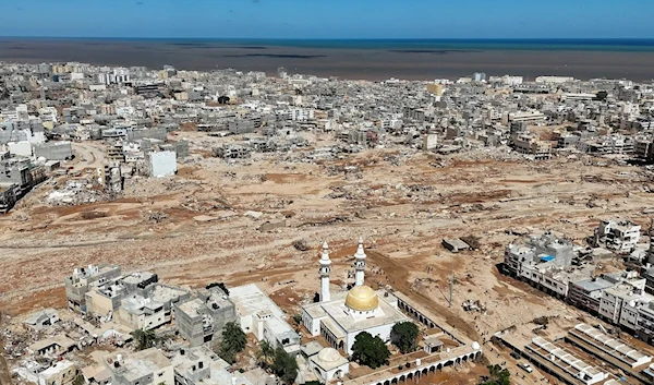 Derna, Libya, has been devastated by flooding from storms this week, which washed swaths of the city into the sea. (AP)