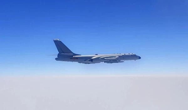 A bomber of the Eastern Theater Command of China's PLA is seen during a combat readiness patrol and military exercises on April 8, 2023. (AP)