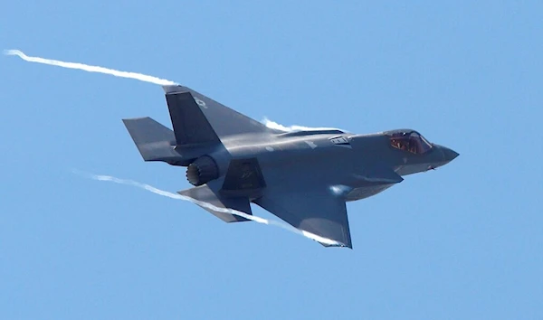 A U.S. F-35 fighter jet of the Vermont Air National Guard flies over Skopje Airport, on Friday, June 17, 2022 (AP Photo/Boris Grdanoski)