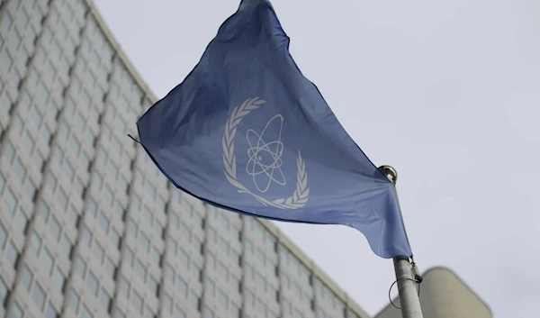 The flag of the IAEA flies in front of its headquarters during an IAEA Board of Governors meeting in Vienna on Feb. 6, 2023. (AP)