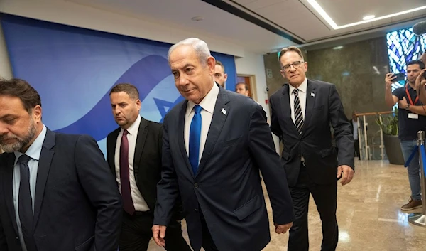 Israeli Prime Minister Benjamin Netanyahu, center, arrives to the weekly cabinet meeting in occupied al-Quds, Sunday, Sep 10, 2023 (AP Photo, Pool)