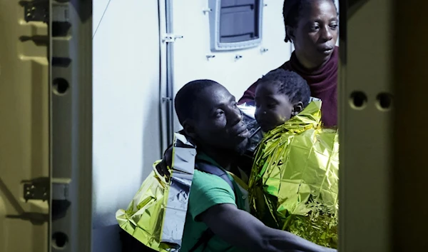 Rescued migrants disembarked from a boat on the Italian island of Lampedusa during the evening of September 16, 2023. (AP)