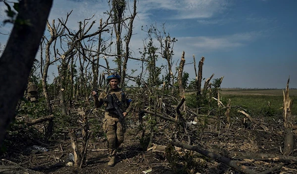 A soldier of Ukraine's 3rd Separate Assault Brigade goes on his position near Bakhmut, Donetsk Monday, September 4, 2023 (AP )