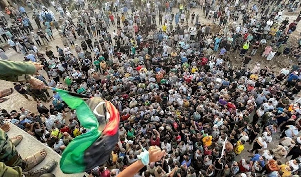 People gather for a demonstration outside the surviving Al-Sahaba mosque in Libya’s eastern city of Derna. (AFP/Getty Images)