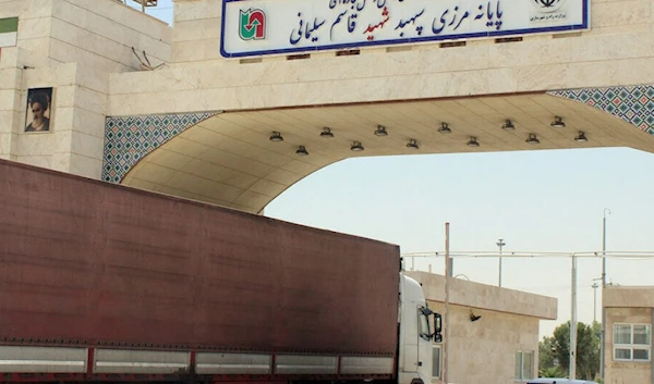 In this undated photo, a truck transporting goods is passing through the Mehran crossing at the Iranian-Iraqi border. (IRNA)