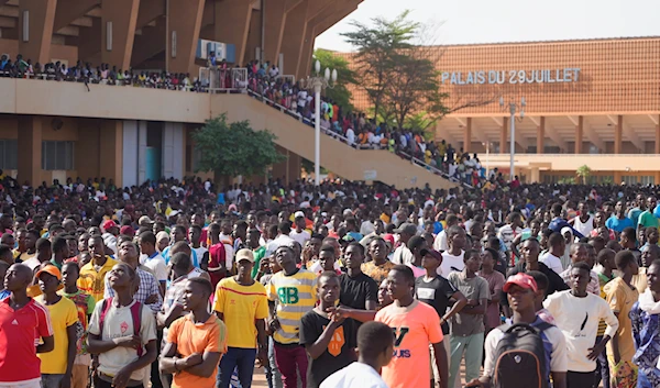 Young people gather to register to volunteer to fight for the country as part of a volunteer initiative, in Niamey, Niger, Saturday, Aug. 19, 2023 (AP Photo/Sam Mednick)