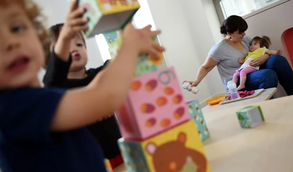 Children play at the childcare center of the Hopital Necker - Enfants Malades hospital in Paris. (AFP)