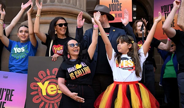 Australia’s Minister for Indigenous Australians Linda Burney (front left) applauds during a “Walk for Yes” rally in Melbourne on September 17, 2023 (AFP)