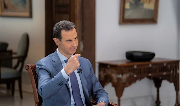 Syrian President Bashar Assad speaks during an interview in Damascus, Syria, Wednesday, Aug. 9, 2023 (AP)