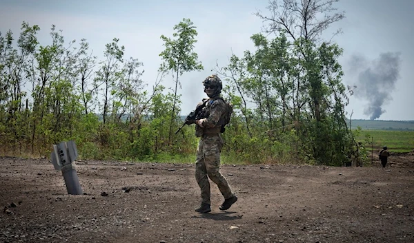 Ukrainian soldiers walk in their positions on the frontline in Zaporizhzhia region, Friday, June 23, 2023 (AP Photo/Efrem Lukatsky, File)