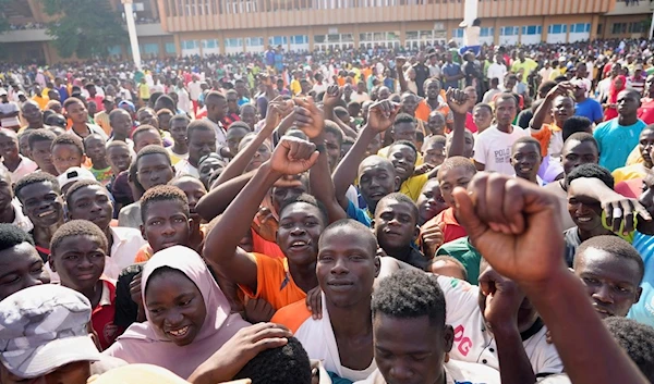 Youth gather to register to volunteer to fight for the country as part of a volunteer initiative, in Niamey, Niger, Saturday, Aug. 19, 2023 (AP)