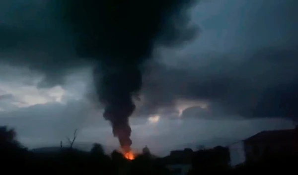 Screen capture from video shows smoke rising after a fuel depot explosion near Stepanakert, Nagorno-Karabakh, September 25, 2023. (Twitter via AP)