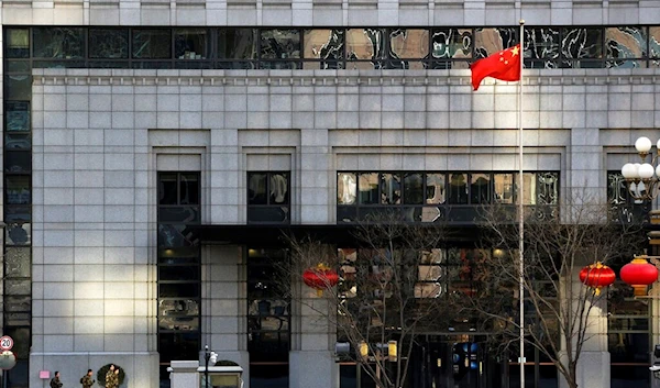 Policemen perform exercises at China's Ministry of Commerce  Beijing, Monday, February 11, 2019 (AP)