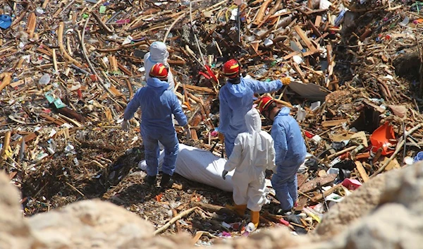 Rescue teams look for flash flood victims in the city of Derna, Libya, on Sept. 18, 2023. (AP)