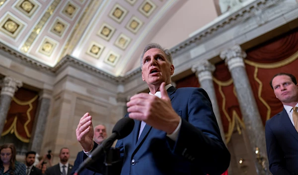 House Speaker Kevin McCarthy talks to reporters just after voting to advance appropriations bills on the House floor, at the Capitol in Washington, Sept. 26, 2023