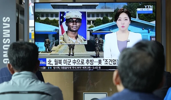 A TV screen showing US soldier Travis King's photo during a news program in Seoul, South Korea on September 28, 2023 (AP)