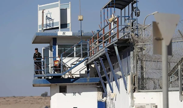 A member of the Israeli security forces stands guard at the Gilboa prison in northern Israel -undated- (AFP)