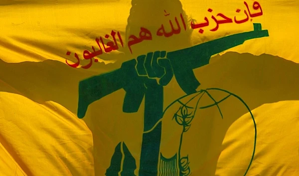 Hezbollah's flag raised during a religious procession Srinagar, Kashmir Tuesday, Aug. 17, 2021 (AP)