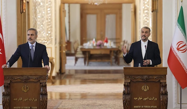 Foreign Minister Hakan Fidan (L) and his Iranian counterpart Hossein Amir-Abdollahian hold a joint news conference in Tehran, Iran, Sept. 3, 2023. (AFP)