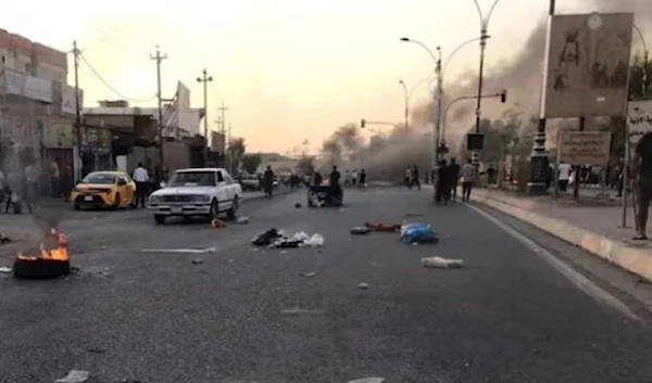 Arab residents blocked a major highway for days after the headquarters of local Iraqi security forces were reportedly set to be handed over to the Kurdistan Democratic Party. (AFP)