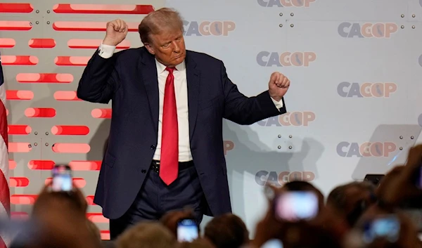 Former President Donald Trump reacts to the crowd after speaking at the California Republican Party Convention Friday, Sept. 29, 2023, in Anaheim, Calif, US (AP Photo/Jae C. Hong)