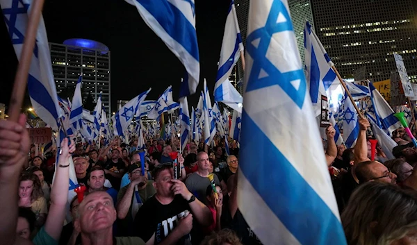 Israelis protest against plans by Prime Minister Benjamin Netanyahu's government to overhaul the judicial system in Tel Aviv, Israel, Saturday, Sept. 30, 2023. (AP)