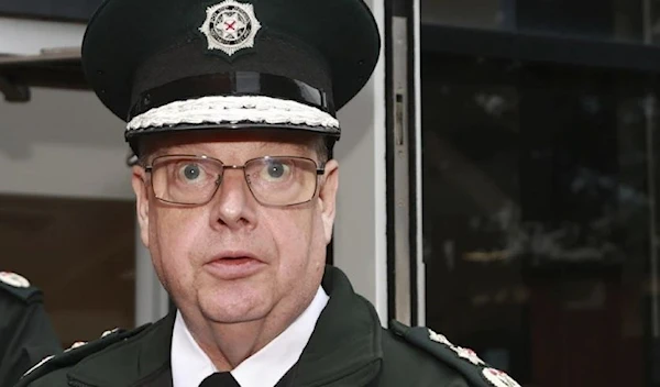 Police Service of Northern Ireland Chief Constable Simon Byrne reads a statement outside James House in Belfast, Northern Ireland, Thursday August 31, 2023. (AP)