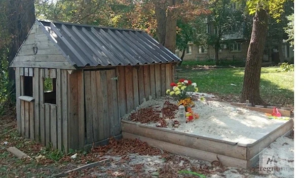 The sandpit where Ilona, the 6 year old girl, in the Donetsk Peoples Republic with Ukrainian missile on September 1, 2023. (Steeve Sweeney)