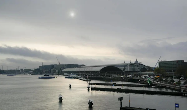 A central station and harbor in Amsterdam, The Netherlands on Oct. 26, 2021 (AP)