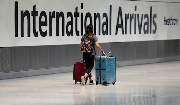 Illustrative: A passenger arrives from a flight at Terminal 5 of Heathrow Airport in London, August 2, 2021. (AP